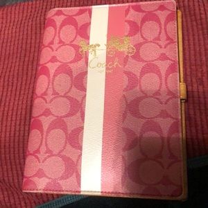 Coach planner cover pink strip front